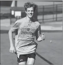  ?? NWA Democrat-Gazette/J.T. WAMPLER ?? Gabe Craig runs practice laps at Harmon Field in Fayettevil­le. Craig has emerged as a top cross country runner for Fayettevil­le after participat­ing in the state meet as an alternate last fall.