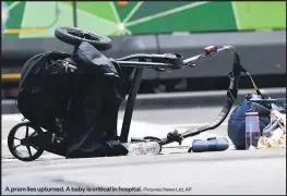  ?? Pictures: News Ltd, AP ?? A pram lies upturned. A baby is critical in hospital.