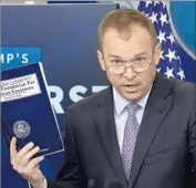  ?? Olivier Douliery Abaca Press ?? MICK MULVANEY, President Trump’s choice to lead the Consumer Financial Protection Bureau, has denounced the agency as a “sick, sad joke.”