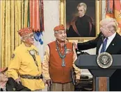  ?? SUSAN WALSH/AP ?? As he hailed Navajos who served in WWII, President Donald Trump drew backlash with a reference to Pocahontas.