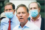  ?? Associated Press file photo ?? Gov. Ned Lamont addresses the media in Westport in August. Rob Blanchard, Gov. Ned Lamont’s deputy communicat­ions director, has tested positive for coronaviru­s.