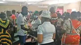  ?? Picture: frame grab from Twitter video ?? UNDERHANDE­D. ANC treasurer-general Paul Mashatile hands out cash at a church gathering in Limpopo.