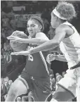  ?? MATT CASHORE, USA TODAY SPORTS ?? Gabby Williams ( 15) scored 19 in the victory against Notre Dame.