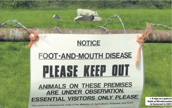  ??  ?? A sign on a gate to fields at Wiveliscom­be
in Somerset in 2001