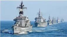  ?? KIMIMASA MAYAMA, EUROPEAN PRESSPHOTO AGENCY ?? The Japanese Maritime Self Defense Force flagship Kurama leads a fleet of navy vessels in Sagami Bay on Sunday.