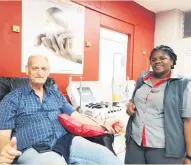  ?? PHOTO: AKHEEL SEWSUNKER ?? Deon Pienaar, who has donated blood 98 times, has urged people to come forth and donate blood. He is pictured with Odwa Siyo from SANBS.