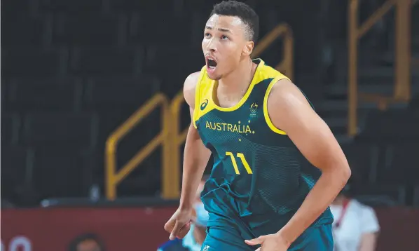  ?? ?? In action at the Tokyo Olympic Games, Aussie Dante Exum faces a nervous wait on the future of his NBA career. Picture Kevin C. Cox/Getty Images)