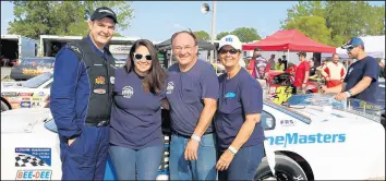  ?? D.J. WELTMEYER PHOTO ?? D.J. Weltmeyer, a driver from Dyer, left, stands with Taylor, Dave and Toni Weltmeyer.