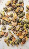  ?? ?? Tandoori Brussels Sprouts are coated in home-made Tandoori Masala and roasted, above, for a nutty and sweet flavor.