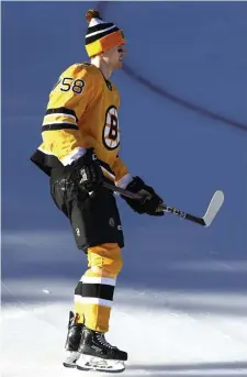  ?? GETTy imAgEs FilE ?? GETTING HIS SHOT: Bruins defenseman Urho Vaakanaine­n, seen Sunday warming up at Lake Tahoe, will get to play with Charlie McAvoy on the first pairing in the absence of Jeremy Lauzon.