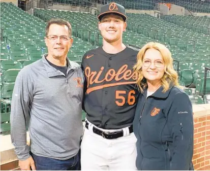  ?? COURTESY JOHN BRADISH ?? Orioles pitcher Kyle Bradish’s family, including his parents, John and Debi Bradish, came to Oriole Park at Camden Yards last week for his start in the major leagues.