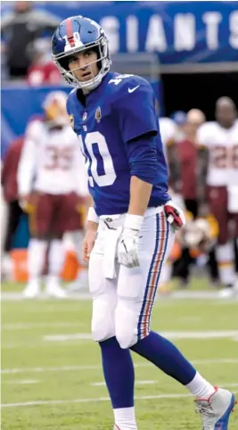  ?? BILL KOSTROUN/AP ?? Giants quarterbac­k Eli Manning belongs on your bench against a Bears defense that leads the league with 20 intercepti­ons and ranks sixth in sacks.
