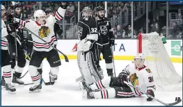  ?? AP ?? Chicago’s David Kampf celebrates a goal nullified because of goalie interferen­ce by teammate Matthew Highmore (36) on March 3.