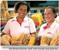  ?? ?? Hot Bread Kitchen staff with breads and pastries.