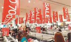  ??  ?? ■
Red sale signs seen across retail outlets in Dubai malls.