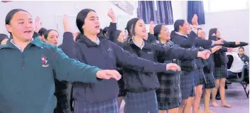  ?? ?? Taupō -nui-a-Tia College kapa haka group Te Awhiorangi performing during the pō whiri for new principal Ben Claxton.