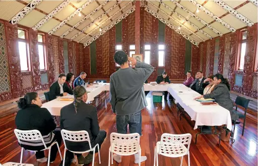  ?? JOHN SELKIRK ?? Marae justice in action in the meeting house at Hoani Waititi Marae in West Auckland. A defendant stands before the court.
