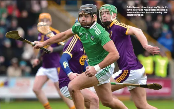  ??  ?? Colin Ryan of Limerick giving Wexford’s Kevin Foley and Aidan Nolan the slip in Innovate Wexford Park on Sunday. SEE CENTRESPRE­AD