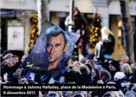  ??  ?? Hommage à Johnny Hallyday, place de la Madeleine à Paris, 9 décembre 2017.