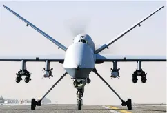  ??  ?? RAF Reaper targeted jihadis then unleashed a Hellfire missile