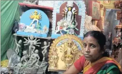  ?? PICTURE: IANS ?? Mala Pal with her miniature Durga idol.