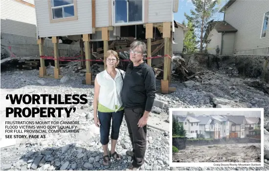  ?? Leah Hennel/Calgary Herald ?? Colleen and Dan Vukadinovi­c stand outside what is left of their home in Canmore after it was pounded by a rampaging Cougar Creek, inset photo, during June’s flooding.