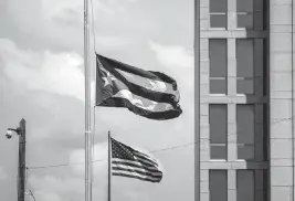  ?? RAMON ESPINOSA AP ?? A Cuban flag flies next to an American flag outside the U.S. embassy in Havana, Cuba, on May 17, 2022.