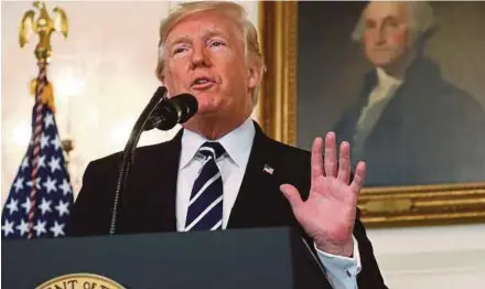  ??  ?? US President Donald Trump addressing the nation at the White House in Washington DC yesterday.