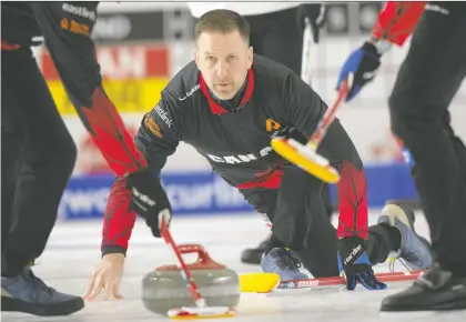  ?? MICHAEL BURNS/CURLING CANADA ?? Team Canada skip Brad Gushue is out to defend his title at the Montana's Brier this week in Regina — but the path certainly isn't an easy one, with the No. 1 ranked Brendan Bottcher rink and a half-dozen other teams boasting the skills needed to win.