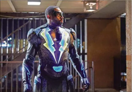  ?? PHOTO COURTESY OF THE CW ?? Cress Williams plays Jefferson Pierce, a father and high school principal who reluctantl­y emerges from superhero retirement in the CW’s “Black Lightning.”