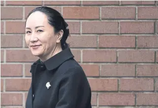  ?? JONATHAN HAYWARD THE CANADIAN PRESS FILE PHOTO ?? Huawei executive Meng Wanzho’s photo shoot comes days before a pivotal B.C. Supreme Court ruling that could set her free, or just set the stage for the next round of legal arguments.