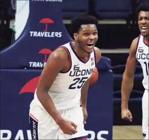  ?? David Butler II / Associated Press ?? UConn forward Josh Carlton (25) reacts after making a basket against DePaul on Dec. 30.