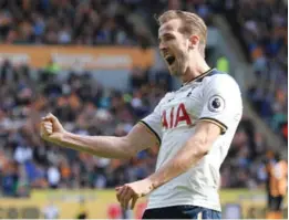  ??  ?? HULL: Tottenham Hotspur’s English striker Harry Kane celebrates his hat trick after scoring his team’s fifth goal during the English Premier League football match between Hull City and Tottenham Hotspur at the KCOM Stadium. —AFP