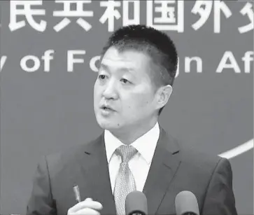  ?? Associated Press ?? LU KANG of China’s Foreign Ministry spoke after Defense Secretary James Mattis told Japan the U.S. would defend Japanese territory, including islands China claims. Lu urged the U.S. to “stop making wrong remarks.”