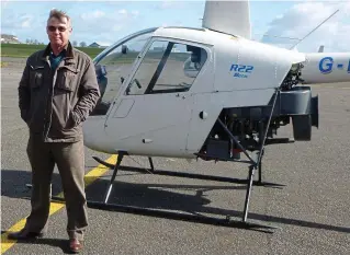  ??  ?? Up, up and away: Chris Gray on a helicopter flying lesson at Manston