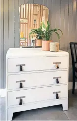  ??  ?? Retro chest of drawers painted white and handmade leather tassel handles added