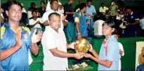  ??  ?? Pictures depict Mr. Lalith De Silva General Manager McLarens Lubricants Ltd handing over championsh­ip trophies to the winners in the under 19 categories.