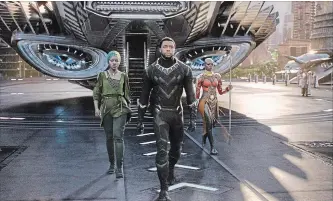  ?? THE ASSOCIATED PRESS ?? Lupita Nyong'o, left, and Chadwick Boseman and Danai Gurira in a scene from "Black Panther."