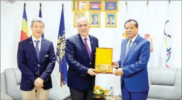  ?? NOCC ?? NOCC head Thong Khon (right) meets with Ingmar De Vos, president of the Internatio­nal Federation for Equestrian sports (FEI), in Phnom Penh on January 30.