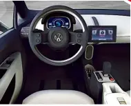  ??  ?? CLEAN Simple design and digital displays appeared on 2007 concept, and production car’s dashtop smartphone cradle offers similar simplicity