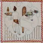  ?? ?? < Each quilt square was embroidere­d by a different woman imprisoned in Changi Jail