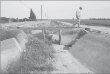  ?? Max Whittaker / the NeW York tiMes ?? Fritz Durst walks over an irrigation canal that hasn’t seen water since 2013 on his farm in Zamora, Calif. In California, 80 percent of water used by humans goes to farming and ranching.