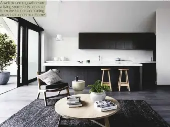  ??  ?? A well-placed rug will ensure a living space feels separate from the kitchen and dining areas in an open-plan home.