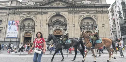  ??  ?? Mounted Chilean police patrol in front of the Metropolit­an Cathedral in Santiago ahead of Pope Francis’s visit to Chile on Saturday. Pope Francis will be in Chile until Thursday.