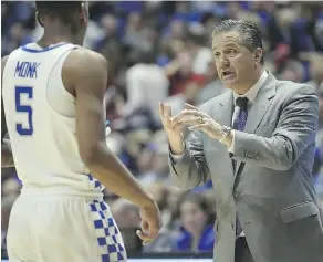  ?? ANDY LYONS/GETTY IMAGES ?? While John Calipari is collecting millions for his role as head coach of a highly lucrative college basketball team, his players don’t get paid and can’t accept endorsemen­ts.