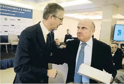  ?? Pere Duran / NORD MEDIA ?? Pablo Hernández de Cos (Banco de España) con Luis de Guindos (BCE)