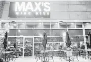  ?? Elizabeth Conley / Houston Chronicle ?? Max’s Wine Dive first opened on Washington Avenue.