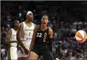  ?? ELLEN SCHMIDT — LAS VEGAS REVIEW-JOURNAL VIA AP ?? Las Vegas Aces forward A’ja Wilson (22) celebrates after Dallas Wings center Teaira McCowan (7) was charged with a foul during the second half Game 1 of a WNBA semifinal series on Sunday in Las Vegas.