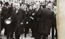  ??  ?? ABOVE: French Prime Minister Georges Clemenceau, US President Woodrow Wilson and British Prime Minister David Lloyd George leaving the Palace of Versailles after signing the peace treaty on 28 June 1919