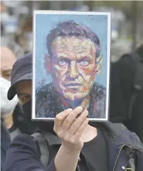 ?? JOHN MACDOUGALL AGENCE FRANCE-PRESSE ?? À l’occasion de son dernier déplacemen­t en Russie, Angela Merkel a réclamé de Vladimir Poutine, vendredi, la libération de Navalny, tout en insistant sur la nécessité d’un dialogue avec la Russie.